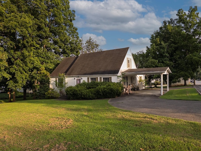 204 Fisher Ave, Carthage, TN 37030 - view of front of home featuring a carport, a front lawn, and driveway