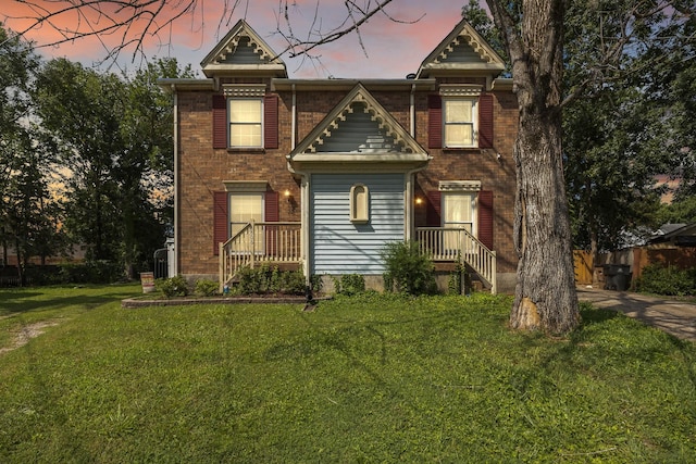 3506 New Windsor Ct, Antioch, TN 37013 - victorian home with a lawn and brick siding