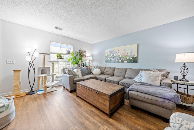 3506 New Windsor Ct, Antioch, TN 37013 - living area featuring wood finished floors and a textured ceiling