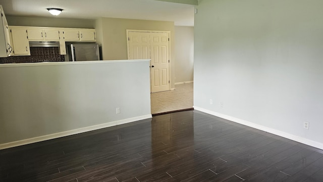 1949 Timberline Cir, Oak Grove, KY 42262 - empty room with dark wood finished floors and baseboards