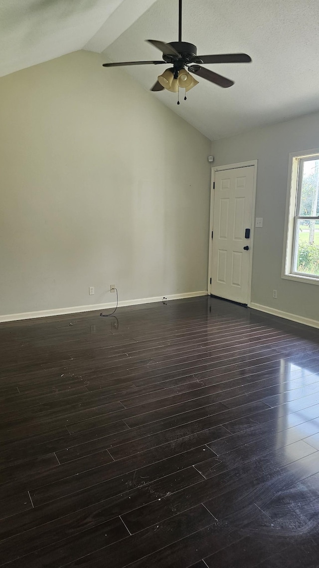 1949 Timberline Cir, Oak Grove, KY 42262 - unfurnished living room featuring a ceiling fan, vaulted ceiling, and dark wood finished floors