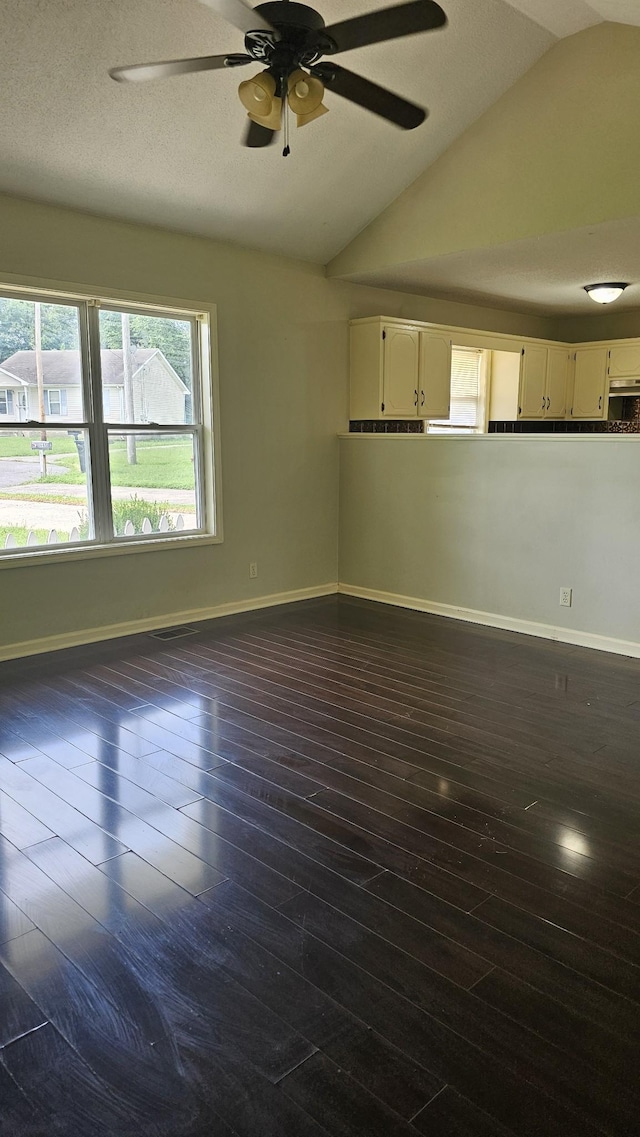 1949 Timberline Cir, Oak Grove, KY 42262 - unfurnished living room with lofted ceiling, ceiling fan, and dark wood-type flooring
