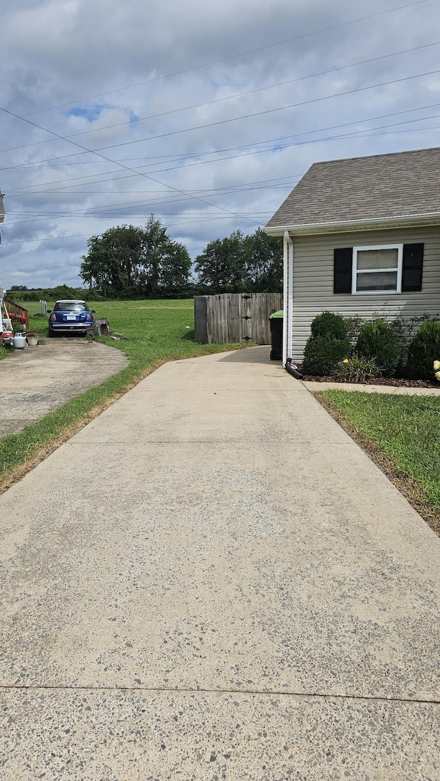 1949 Timberline Cir, Oak Grove, KY 42262 - view of side of home with driveway and roof with shingles