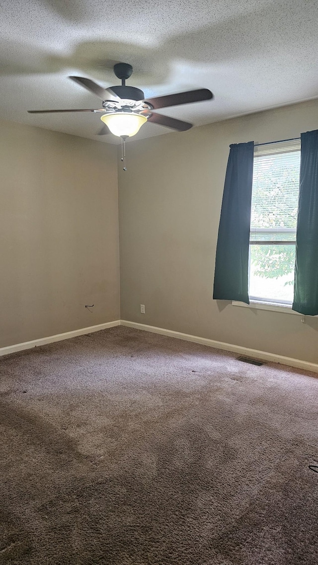 1949 Timberline Cir, Oak Grove, KY 42262 - carpeted empty room featuring a textured ceiling and ceiling fan