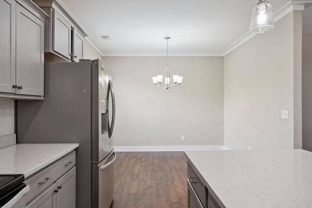 1412 Wrangler Ln, Smyrna, TN 37167 - kitchen featuring ornamental molding, dark wood finished floors, a chandelier, electric range oven, and decorative light fixtures