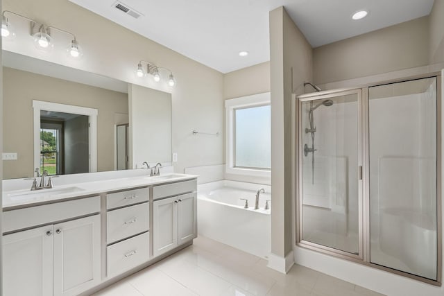 1412 Wrangler Ln, Smyrna, TN 37167 - full bathroom with a shower stall, a bath, double vanity, and tile patterned flooring