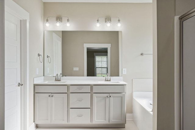 1412 Wrangler Ln, Smyrna, TN 37167 - bathroom featuring double vanity and a bath