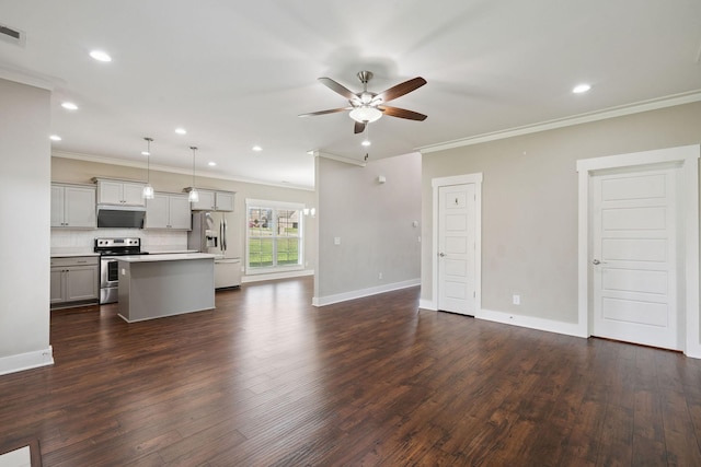1412 Wrangler Ln, Smyrna, TN 37167 - unfurnished living room with ornamental molding, ceiling fan, dark wood-style flooring, and recessed lighting