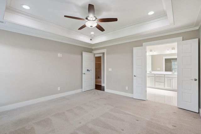 1412 Wrangler Ln, Smyrna, TN 37167 - unfurnished bedroom featuring ornamental molding, a raised ceiling, light carpet, ensuite bath, and recessed lighting
