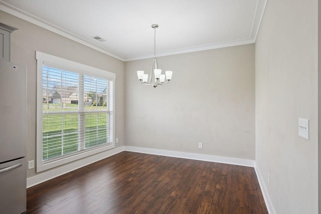 1412 Wrangler Ln, Smyrna, TN 37167 - unfurnished dining area featuring a chandelier, dark wood-type flooring, and crown molding