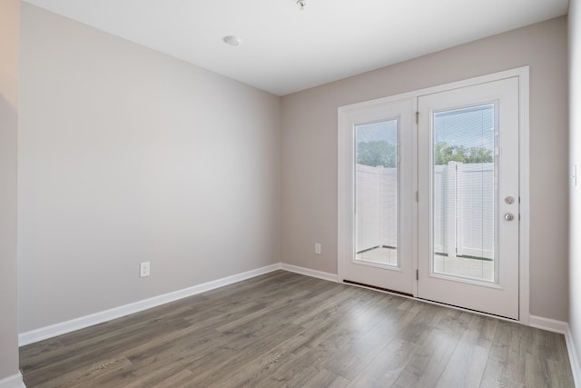 215 Ruth Way, Spring Hill, TN 37174 - spare room with wood finished floors and fire sprinkler in ceiling