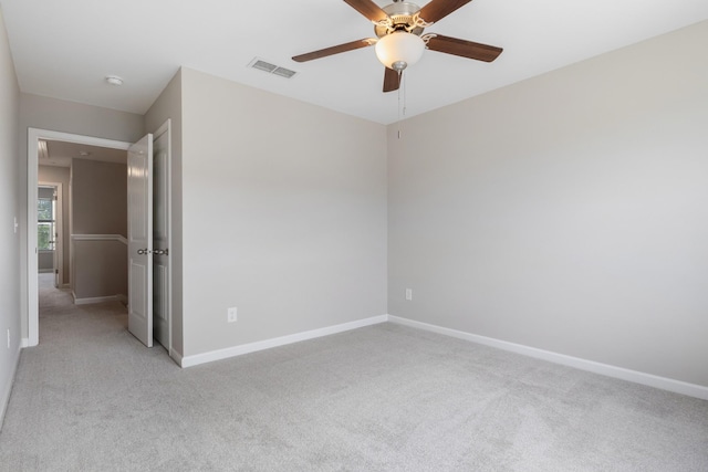 215 Ruth Way, Spring Hill, TN 37174 - empty room featuring light carpet, a ceiling fan, and a smoke detector