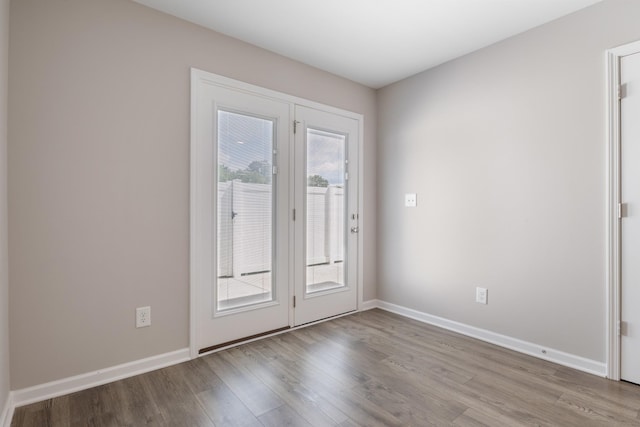 215 Ruth Way, Spring Hill, TN 37174 - doorway to outside with wood finished floors and baseboards