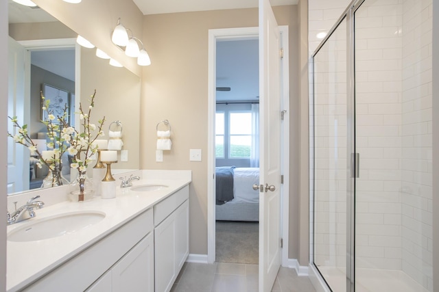 1768 Williamsport Lndg, Columbia, TN 38401 - full bath with connected bathroom, double vanity, a shower stall, and tile patterned floors