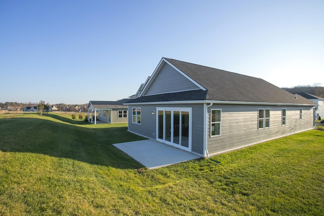 1768 Williamsport Lndg, Columbia, TN 38401 - back of house featuring a lawn and a patio area