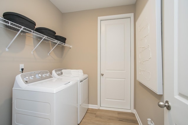 1768 Williamsport Lndg, Columbia, TN 38401 - laundry room featuring separate washer and dryer and light wood finished floors