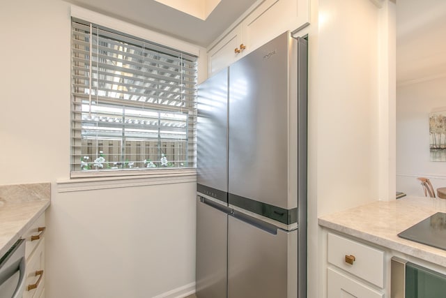 1002 E Northfield Blvd Unit A102, Murfreesboro, TN 37130 - kitchen featuring stainless steel appliances, white cabinets, and light countertops