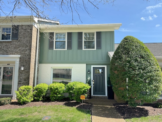 1002 E Northfield Blvd Unit A102, Murfreesboro, TN 37130 - view of front of home with brick siding and board and batten siding