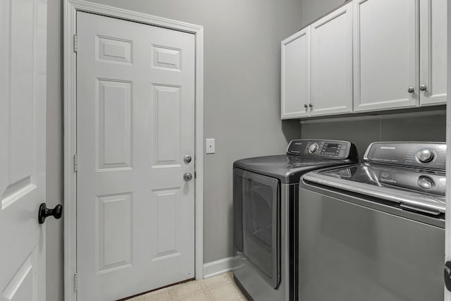 205 Seneca Ct, Franklin, TN 37067 - laundry area with washing machine and clothes dryer and cabinet space