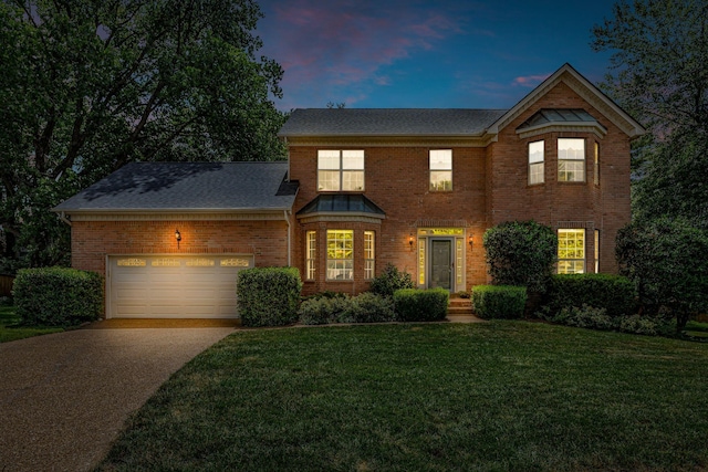 205 Seneca Ct, Franklin, TN 37067 - view of front of home featuring brick siding, concrete driveway, a front lawn, an attached garage, and roof with shingles