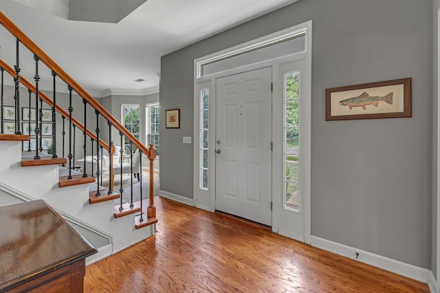 205 Seneca Ct, Franklin, TN 37067 - entryway with wood finished floors, stairway, and ornamental molding