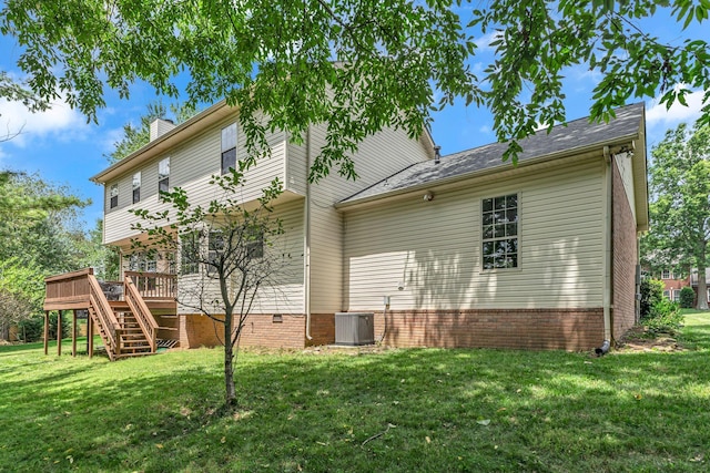 205 Seneca Ct, Franklin, TN 37067 - rear view of house with stairway, a yard, a wooden deck, and a chimney