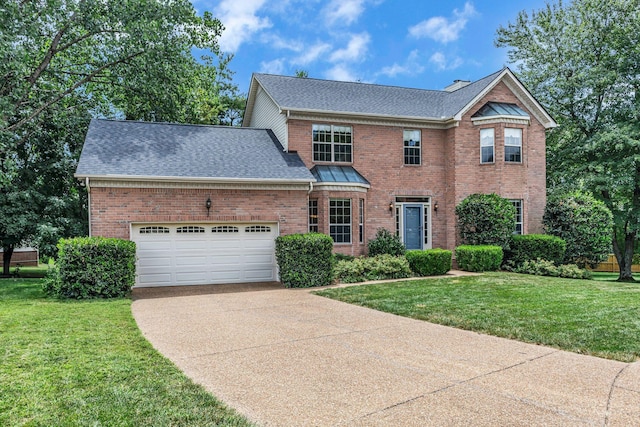 205 Seneca Ct, Franklin, TN 37067 - view of front of house featuring brick siding, a shingled roof, an attached garage, and driveway