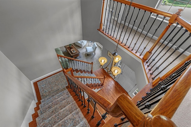 205 Seneca Ct, Franklin, TN 37067 - staircase with a high ceiling and wood finished floors