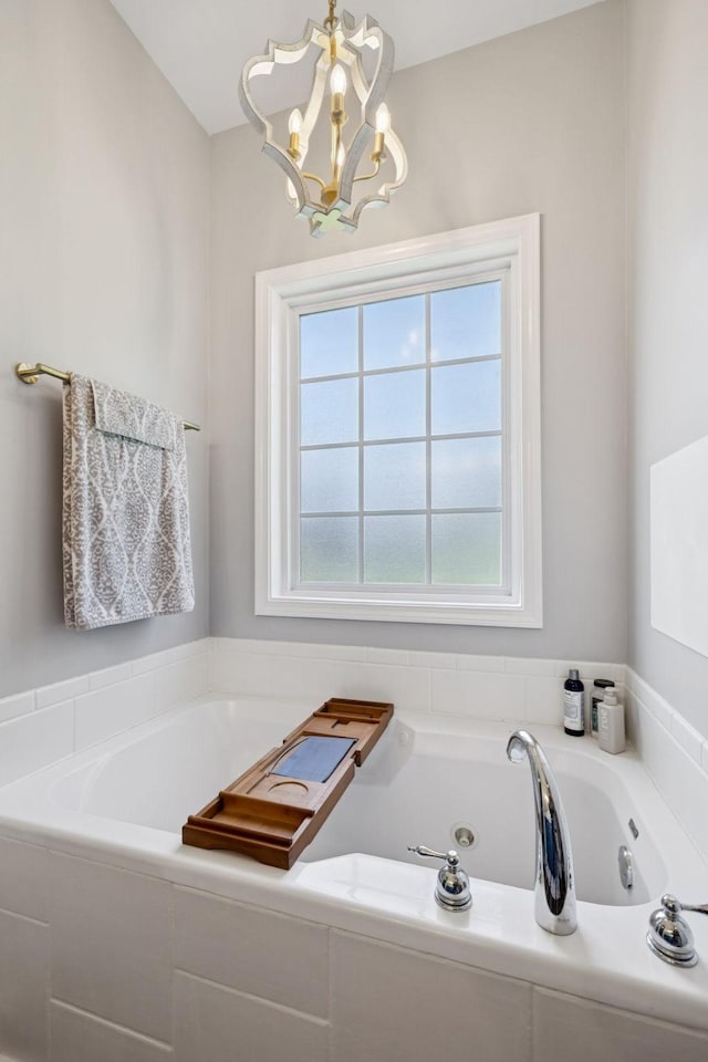 163 Bland Dr, Mount Juliet, TN 37122 - bathroom featuring a chandelier and a bath