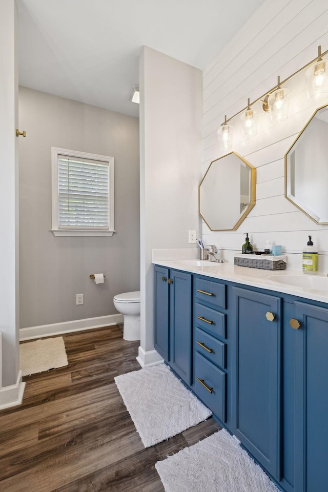 163 Bland Dr, Mount Juliet, TN 37122 - bathroom featuring double vanity, wood finished floors, and wood walls