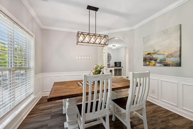 163 Bland Dr, Mount Juliet, TN 37122 - dining area with arched walkways, dark wood-type flooring, crown molding, a decorative wall, and a wainscoted wall