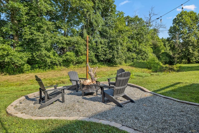 163 Bland Dr, Mount Juliet, TN 37122 - view of green lawn with an outdoor fire pit and a patio area