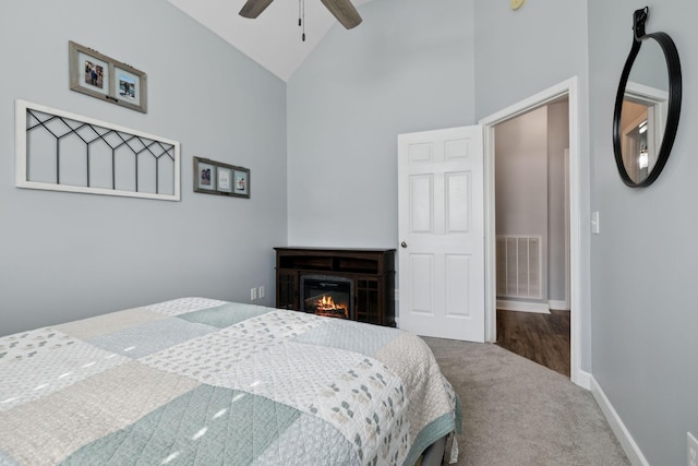 163 Bland Dr, Mount Juliet, TN 37122 - bedroom with carpet, a glass covered fireplace, high vaulted ceiling, and a ceiling fan