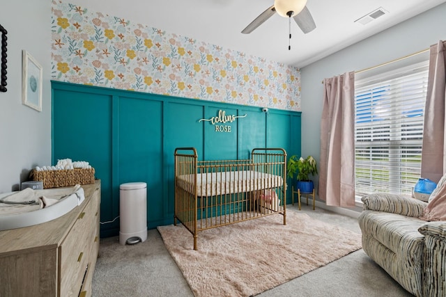 163 Bland Dr, Mount Juliet, TN 37122 - bedroom featuring carpet floors, multiple windows, wallpapered walls, wainscoting, and ceiling fan