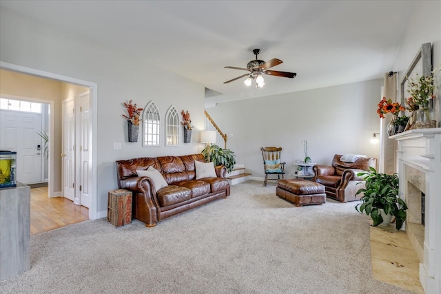 1301 Saybrook Xing, Thompsons Station, TN 37179 - carpeted living area featuring a fireplace and a ceiling fan