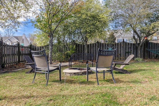 1301 Saybrook Xing, Thompsons Station, TN 37179 - fenced backyard with a fire pit