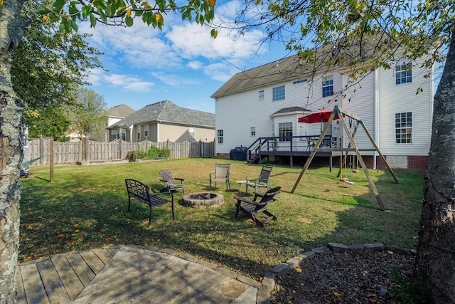 1301 Saybrook Xing, Thompsons Station, TN 37179 - view of yard featuring an outdoor fire pit and a deck