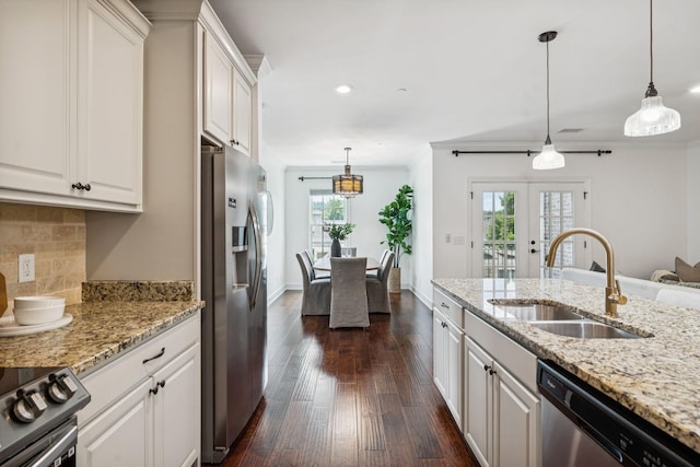 6000 Keats St Unit 202, Franklin, TN 37064 - kitchen featuring appliances with stainless steel finishes, plenty of natural light, dark wood-style flooring, white cabinetry, and recessed lighting