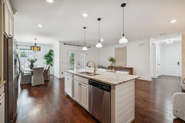 6000 Keats St Unit 202, Franklin, TN 37064 - kitchen with appliances with stainless steel finishes, a center island with sink, dark wood-type flooring, recessed lighting, and light stone countertops