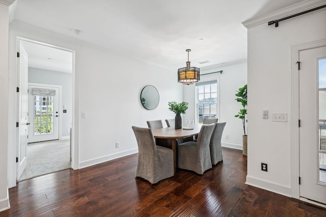 6000 Keats St Unit 202, Franklin, TN 37064 - dining space with dark wood finished floors, crown molding, and a chandelier