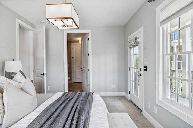 6000 Keats St Unit 202, Franklin, TN 37064 - bedroom featuring baseboards and light colored carpet