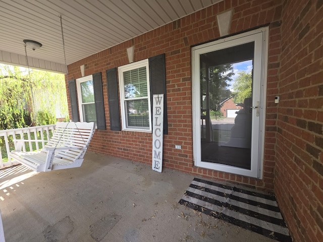 1215 Chapmans Retreat Dr, Spring Hill, TN 37174 - entrance to property featuring a porch and brick siding