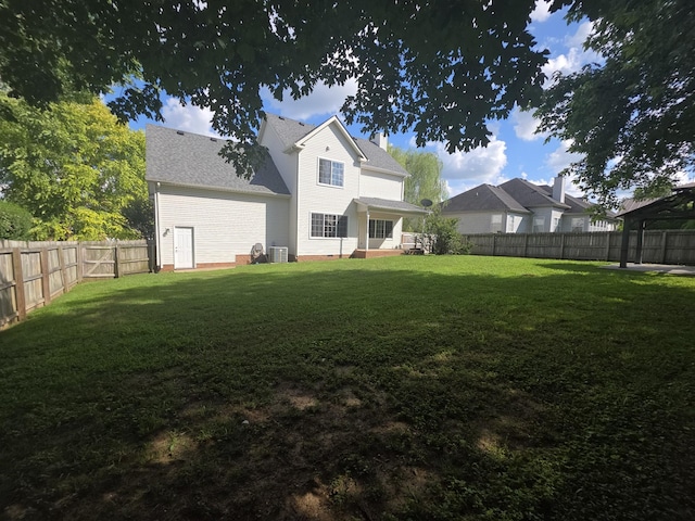 1215 Chapmans Retreat Dr, Spring Hill, TN 37174 - rear view of house with a fenced backyard