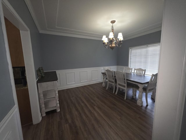 1215 Chapmans Retreat Dr, Spring Hill, TN 37174 - dining area featuring a chandelier, dark wood-style flooring, ornamental molding, and wainscoting