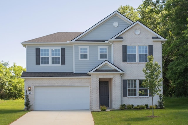137 W Cassa Way, Mount Juliet, TN 37122 - view of front of property featuring concrete driveway, a garage, and a front lawn