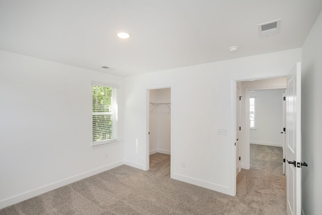 137 W Cassa Way, Mount Juliet, TN 37122 - unfurnished bedroom with light colored carpet and a spacious closet