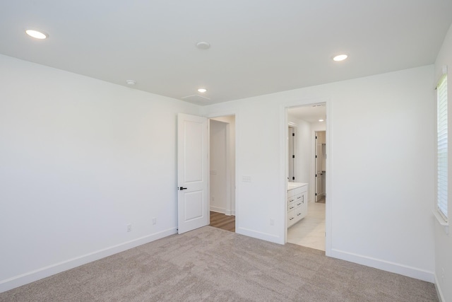 137 W Cassa Way, Mount Juliet, TN 37122 - unfurnished bedroom with light colored carpet, recessed lighting, and connected bathroom