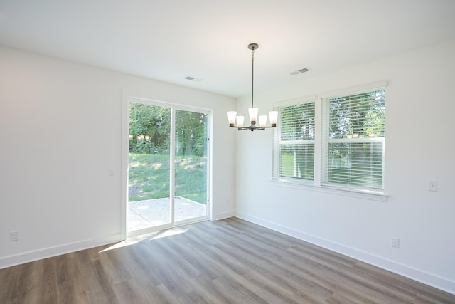 137 W Cassa Way, Mount Juliet, TN 37122 - unfurnished room with a chandelier and wood finished floors