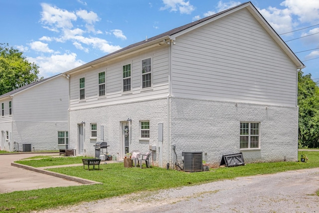 252 Caroline Dr Unit A, Murfreesboro, TN 37128 - view of property exterior featuring brick siding and a yard