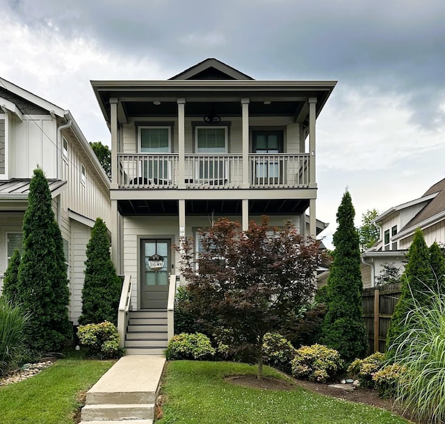 3511B Park Ave, Nashville, TN 37209 - view of front of house with a balcony, board and batten siding, and covered porch